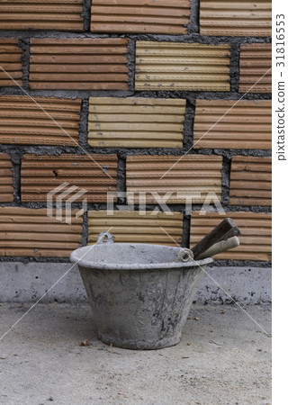 Cement buckets and tools with red brick wall Cement buckets and tools with red brick wall 31816553