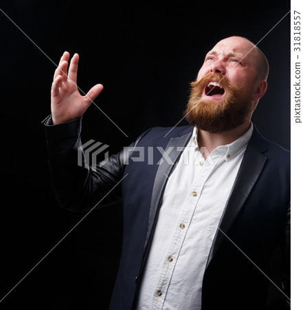 Man with ginger mustache sings 31818557