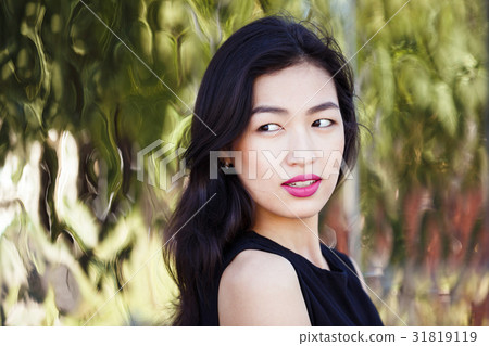 Portrait of the cheerful asian woman Portrait of the cheerful asian woman 31819119