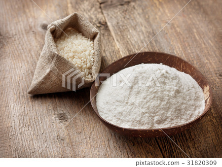 rice flour in a wooden bowl rice flour in a wooden bowl 31820309