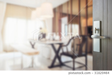 opened wooden door to modern dining room interior opened wooden door to modern dining room interior 31820464