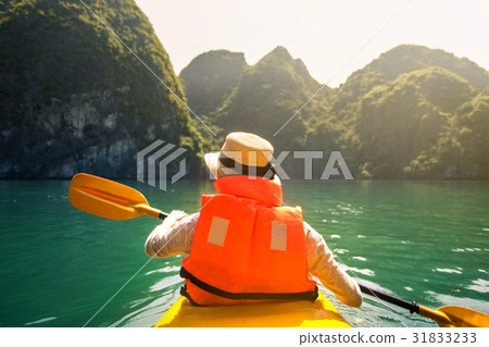 Tourist kayaking in Halong bay seaside of Vietnam 31833233