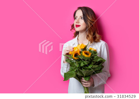 Portrait of young red-haired girl with sunflowers Portrait of young red-haired girl with sunflowers 31834529