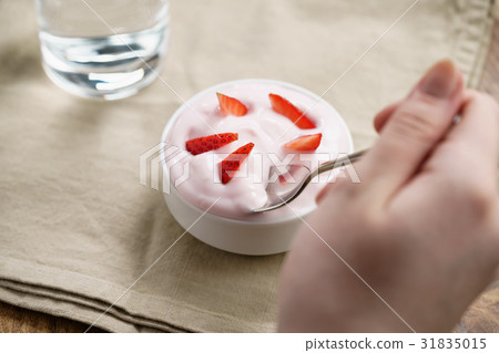 pov teen girl hand eating organic strawberry pov teen girl hand eating organic strawberry 31835015