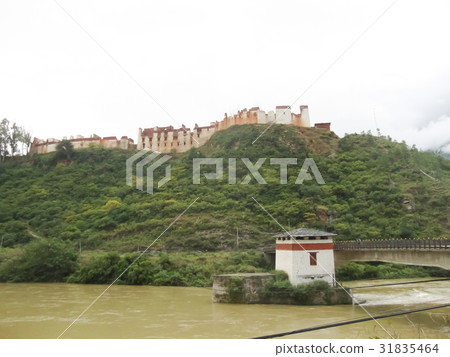 Bridge over the river in Bhutan 31835464