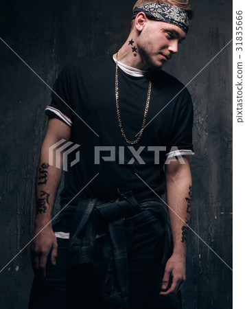 Dangerous tattooed ghetto gang member man Dangerous tattooed ghetto gang member man 31835666