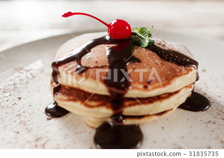 American breakfast. Pancakes with chocolate American breakfast. Pancakes with chocolate 31835735