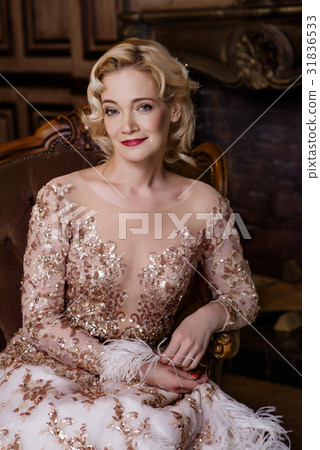 Woman in golden dress in retro style Woman in golden dress in retro style 31836533