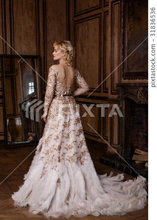 Woman in golden dress in retro style Woman in golden dress in retro style 31836536