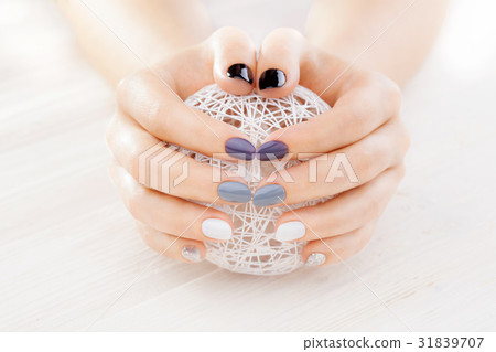 gray manicure with a white ball of yarn gray manicure with a white ball of yarn 31839707