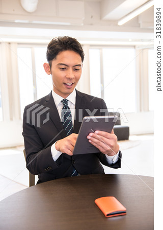 Business business scene Core working cafe tablet young man male employee handsome guy 31839894