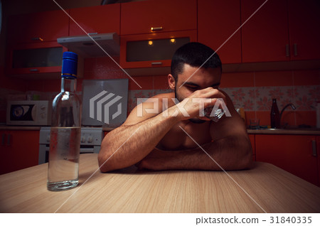 Young man having troubles with alcohol 31840335