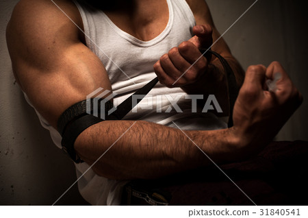 Drug addicted man doing injection Drug addicted man doing injection 31840541