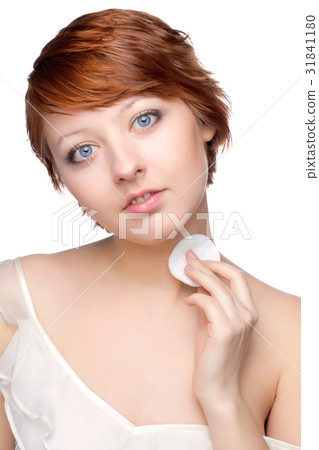 Young woman at morning making the spa treatment Young woman at morning making the spa treatment 31841180
