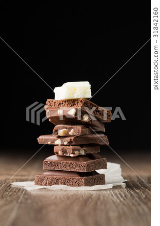 Pieces of white, porous chocolate Pieces of white, porous chocolate 31842160