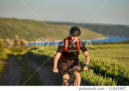 Attractive cyclist riding mountain bicyclist in 31842967