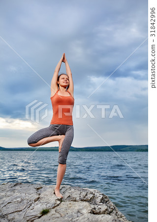 Young sporty woman doing different variants of Young sporty woman doing different variants of 31842996
