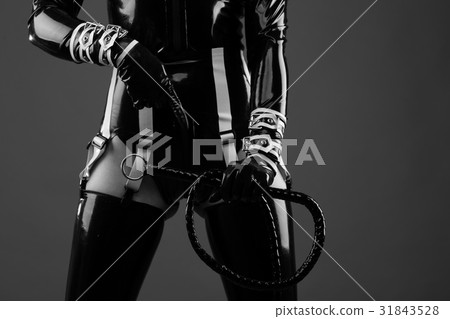 Sensual woman in black latex costume Sensual woman in black latex costume 31843528