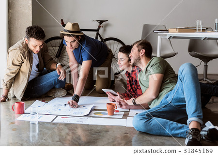 Creative team discussing interesting issue Creative team discussing interesting issue 31845169