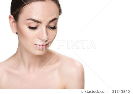 Beautiful young lady presenting concealer Beautiful young lady presenting concealer 31845840