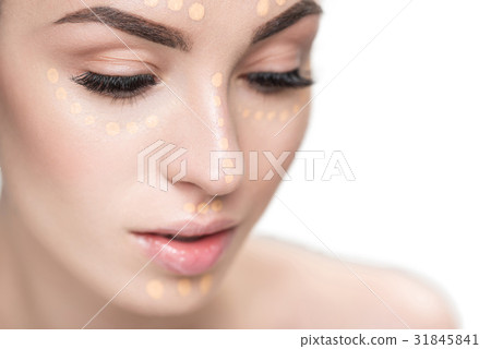 Beautiful lady with concealer on face Beautiful lady with concealer on face 31845841