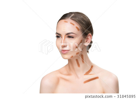 Sensual pretty young lady doing base make-up 31845895