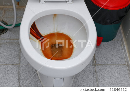 Toilet dirty , Rusty water in public toilet bowl Toilet dirty , Rusty water in public toilet bowl 31846312