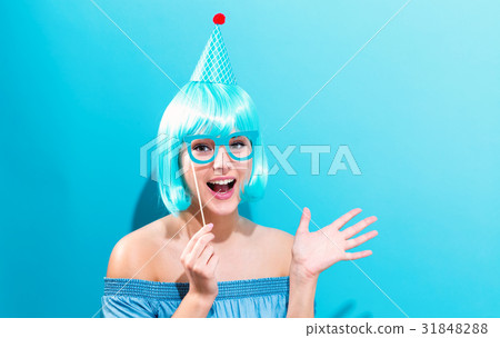 Beautiful woman in a bright blue wig 31848288