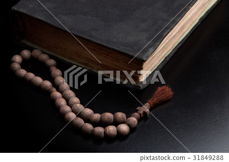 Old book and church rosary Old book and church rosary 31849288