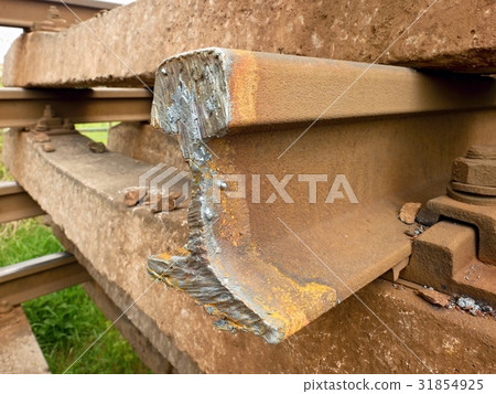 Autogen torch  cut rail rod on concrete sleeper. 31854925