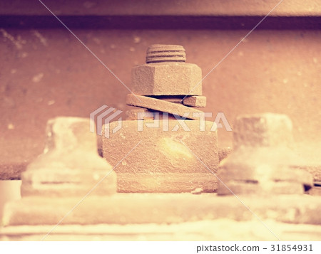 Selective field of focus. Rusty screws and nut 31854931