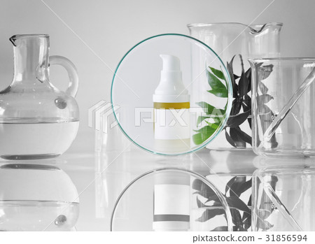 Cosmetic bottle containers with green herbal leave 31856594