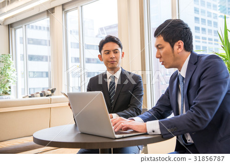 Business meeting Core working meeting Participate Committed male employee two people handsome 31856787