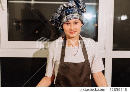 Woman bake pies. Confectioners make desserts Woman bake pies. Confectioners make desserts 31859348