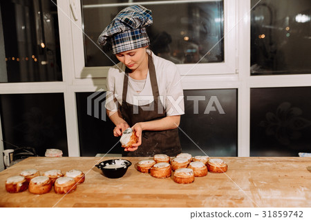 cinnamon rolls sprinkled with icing cinnamon rolls sprinkled with icing 31859742