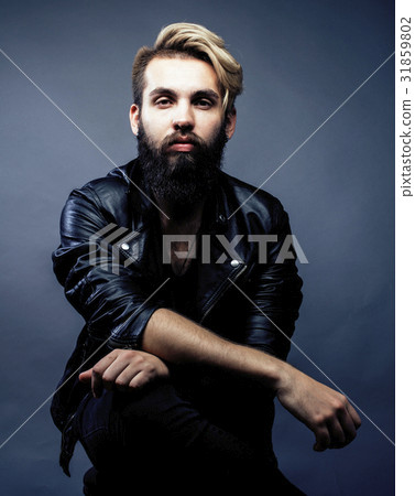 portrait of young bearded hipster guy smiling on 31859802