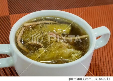 The chinese braised fish maw in red gravy soup The chinese braised fish maw in red gravy soup 31860215