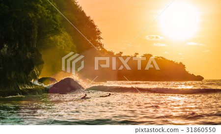 Surf on sunset on beautiful Crystal Bay, Nusa 31860550