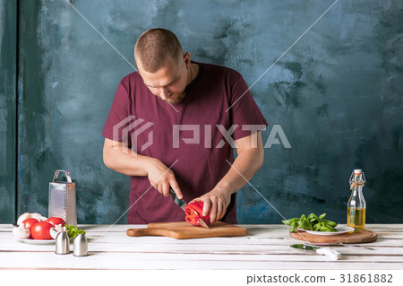 Closeup hand of chef baker making pizza at kitchen Closeup hand of chef baker making pizza at kitchen 31861882
