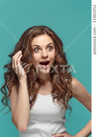 Portrait of young woman with shocked facial Portrait of young woman with shocked facial 31862052