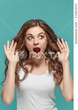 Portrait of young woman with shocked facial 31862053