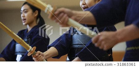 A girl driving into kendo A girl driving into kendo 31863361