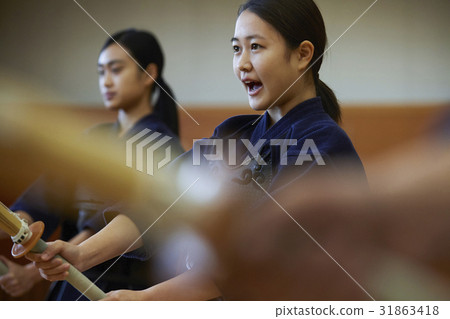 A girl driving into kendo 31863418