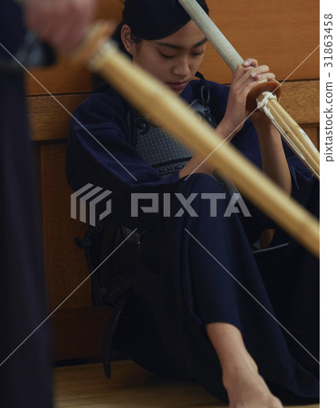 A girl driving into kendo A girl driving into kendo 31863458