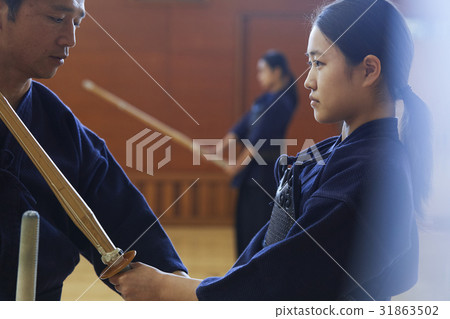 A girl driving into kendo A girl driving into kendo 31863502