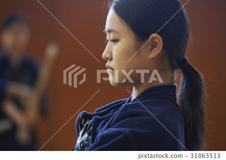 A girl driving into kendo 31863513