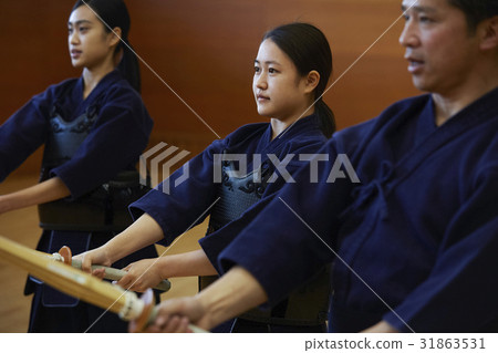 A girl driving into kendo 31863531