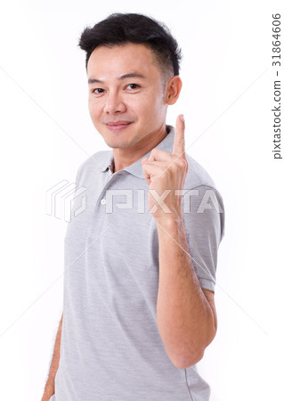 happy, smiling man giving no.1 hand gesture happy, smiling man giving no.1 hand gesture 31864606