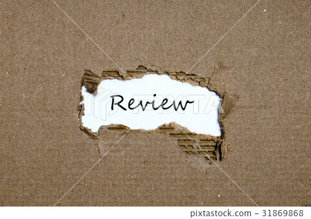 The word review appearing behind torn paper 31869868