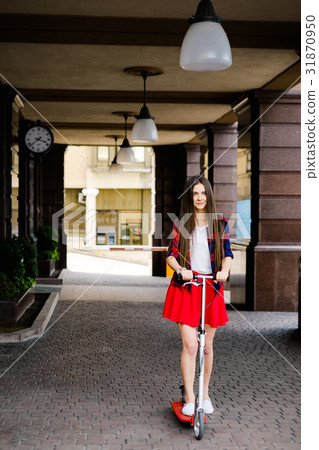 woman travelling by scooter 31870950